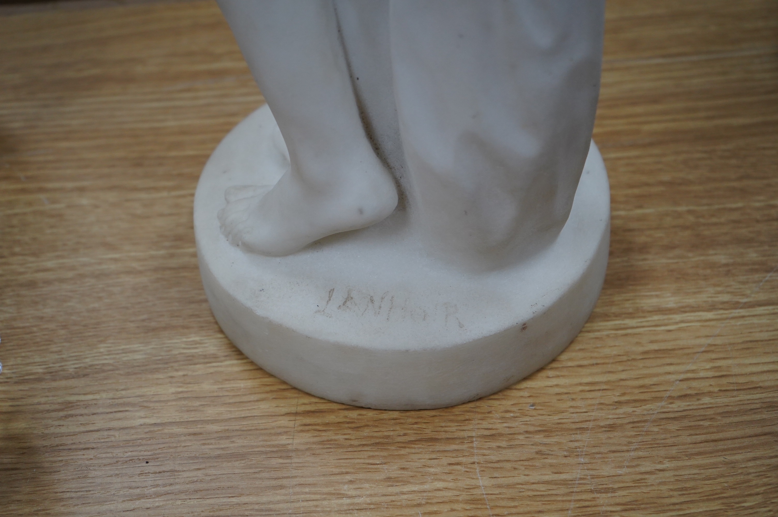 Lenhoir. A Carrara marble figure of a standing maiden, signed, 64cm high. Condition - fair to good